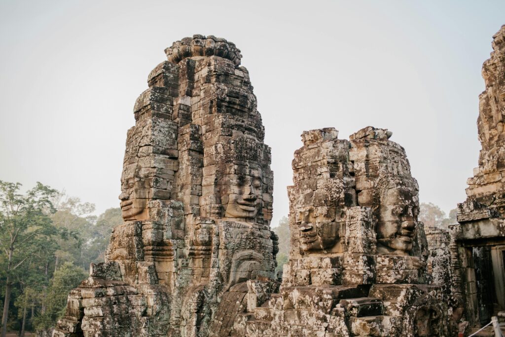 Stone-carved smiling faces of Bayon temple, Angkor Thom