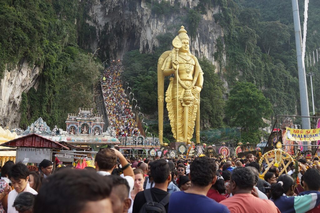 Thaipusam festival at Batu Caves Devotees during Thaipusam procession at Batu Caves
