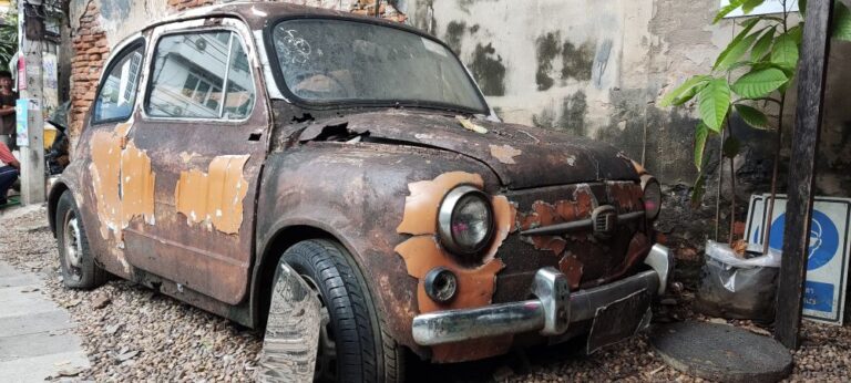 Vintage chocolate-colored car in front of the Chocolate Bar, Talat Noi Bangkok