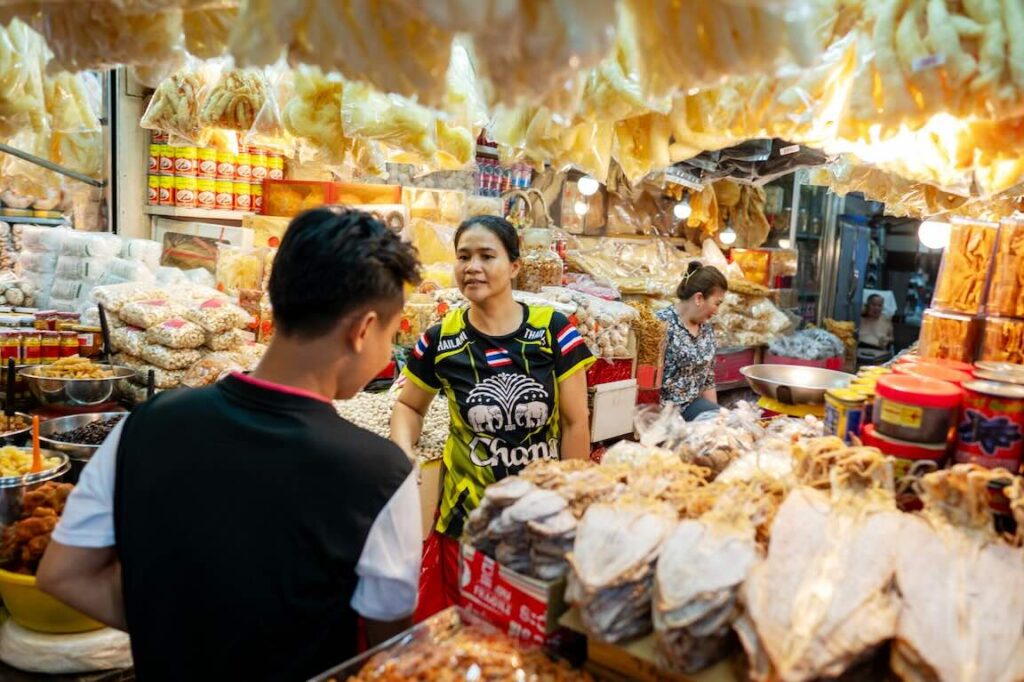 Friendly bargaining at a market Friendly bargaining at a market